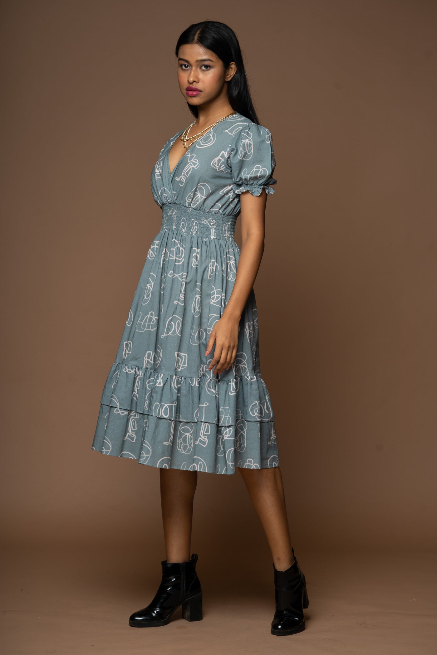 Crisscross Elegance Midi Dress in "And I dream more" Pattern